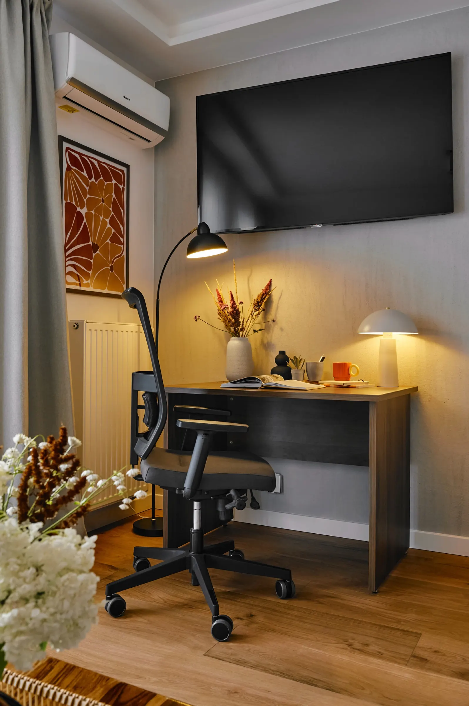 Desk with a lamp and office chair