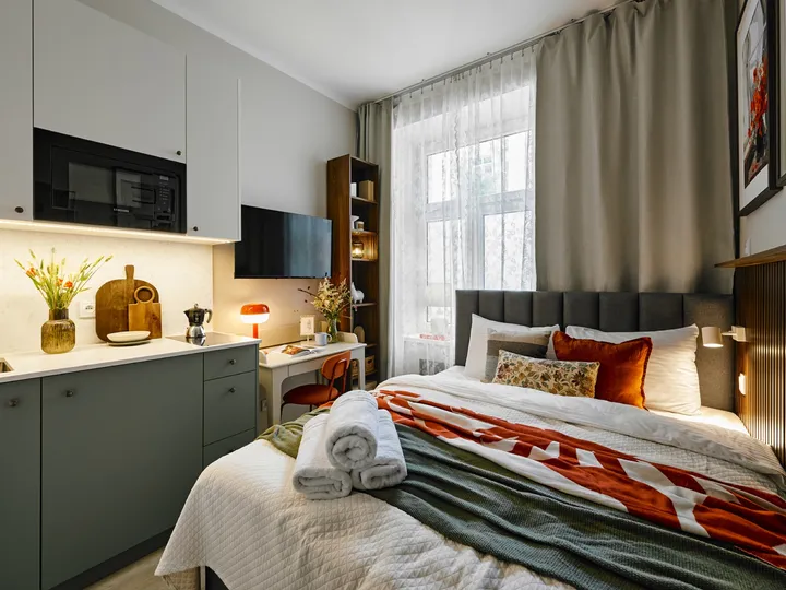 The bed and the kitchenette