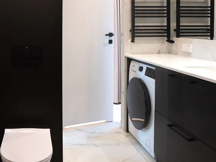 Bathroom with a heated towel rail