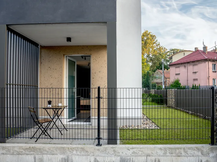 Private terrace with outdoor furniture and a lawn